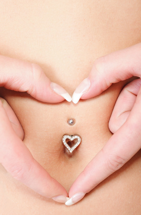 hands heart symbol around navel piercing